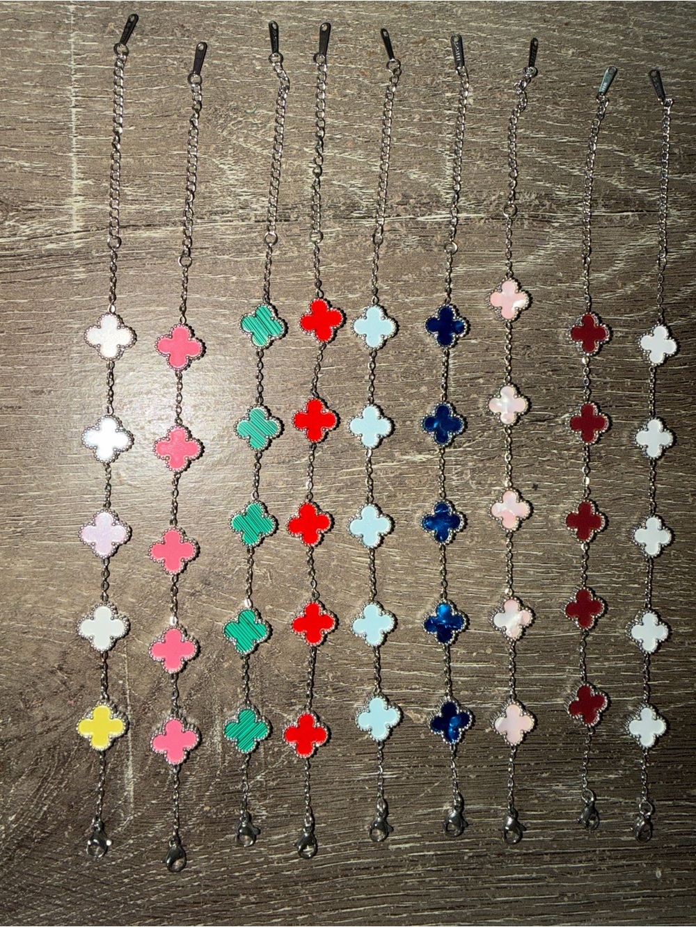 Lot (12) Stainless Steel clover necklaces and bracelets
